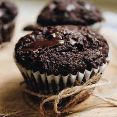 closeup image of 4 dark low-carb chocolate muffins