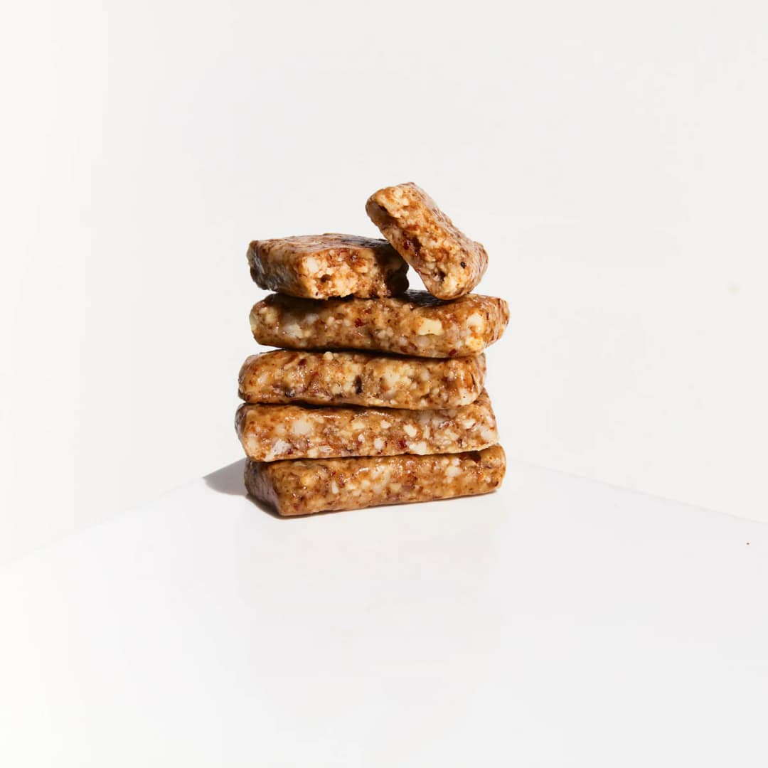 Fatt - Caramel + Sea Salt 3 Fatt - Caramel + Sea Salt bar stacked on top of eachother on a grey background.