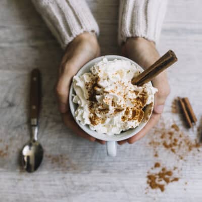 hands holding a cup of low carb hot chocolate