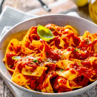 keto pasta bolognese in a bowl, placed on a napkin.