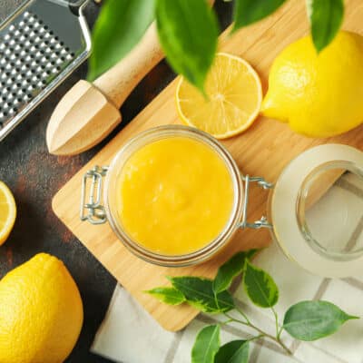 low carb lemon curd lemons and tools on a chopping board