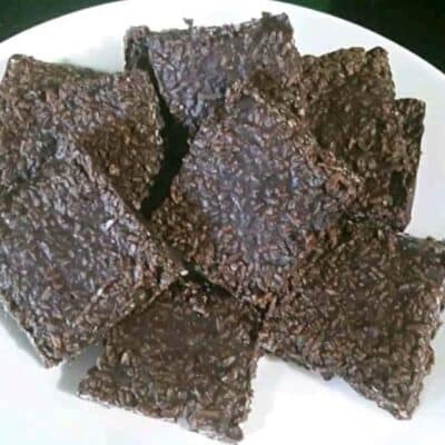 low-carb coconut chocolate squares on a white plate