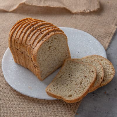 400g seeded and sliced low-carb loaf on a grey plate