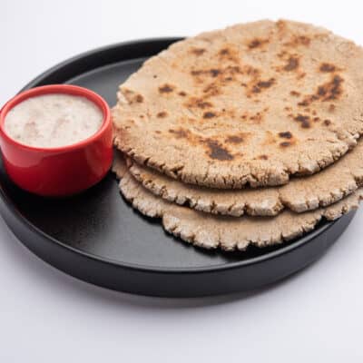 3 low-carb flatbread on a plate with dip