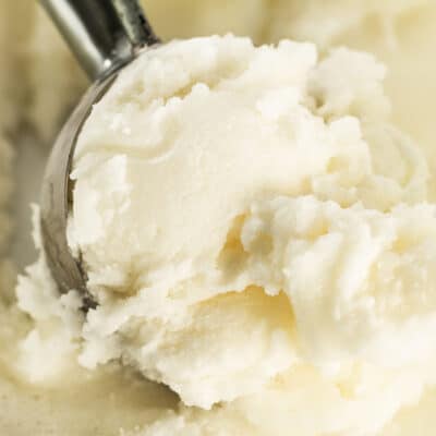 close up shot of keto ice cream with a scoop in it